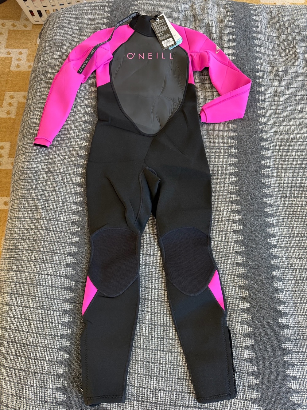 O'Neill Kids Wetsuit in Black and Hot Pink